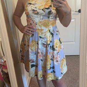 never worn still has tags super cute purple floral dress with pockets!!!
